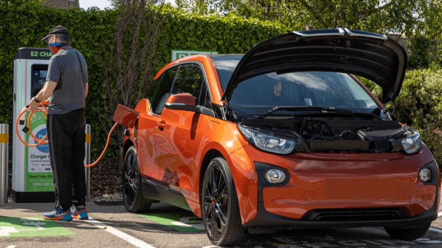 An electric car and charging point