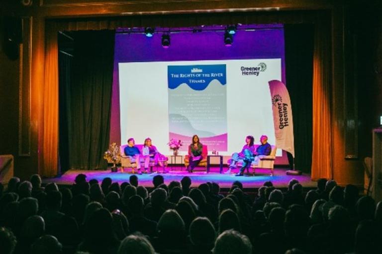 A panel talk and presentation happening in a theatre on 'The Rights of the River Thames'.